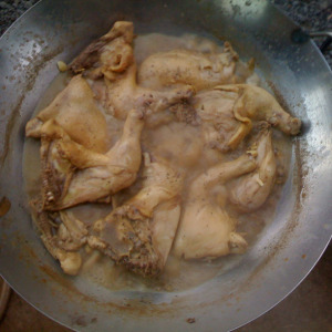 Chicken Adobo flipped while frying