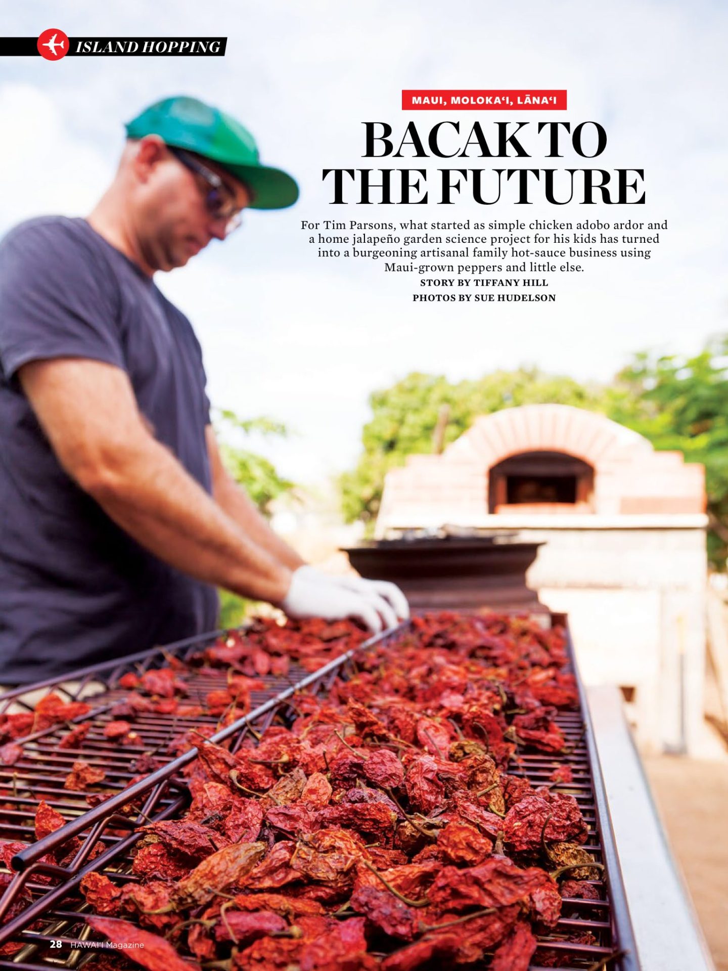 Tim loading and unloadin the smoker with ghost peppers