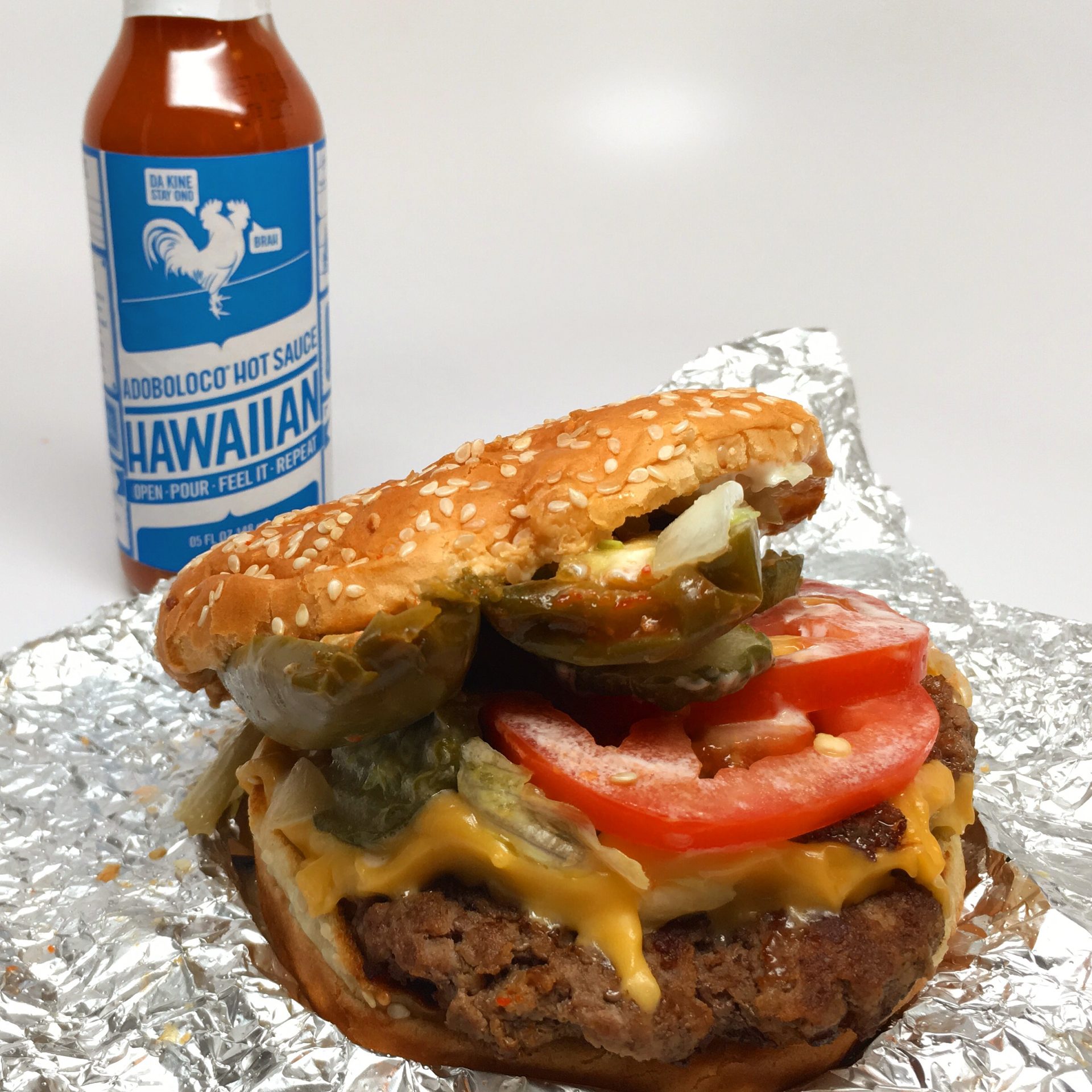 Five Guys Cheese Burger with Jalapeno Chicos and Adoboloco Hawaiian Hot Sauce