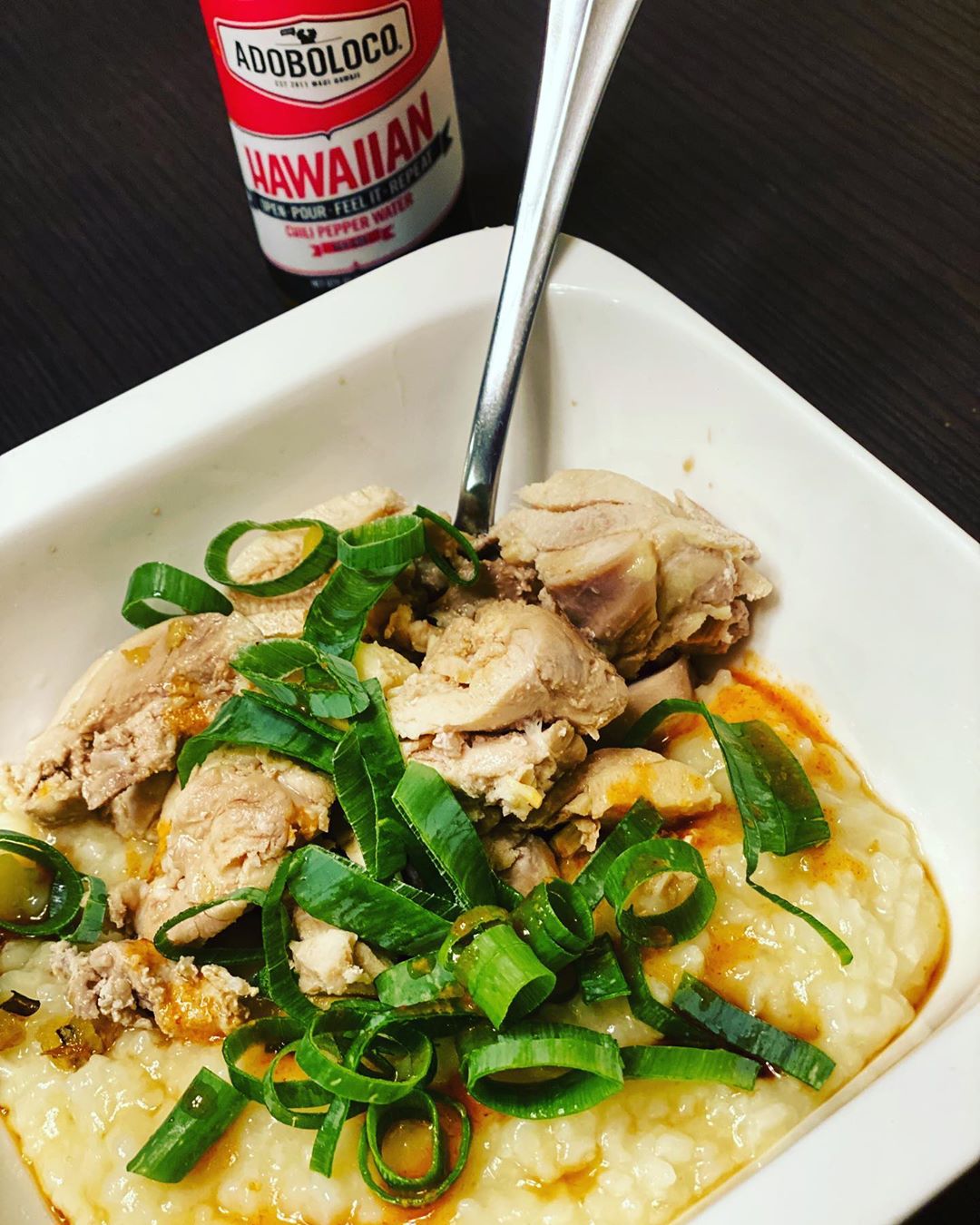 Ginger chicken congee with Hawaiian chili pepper water